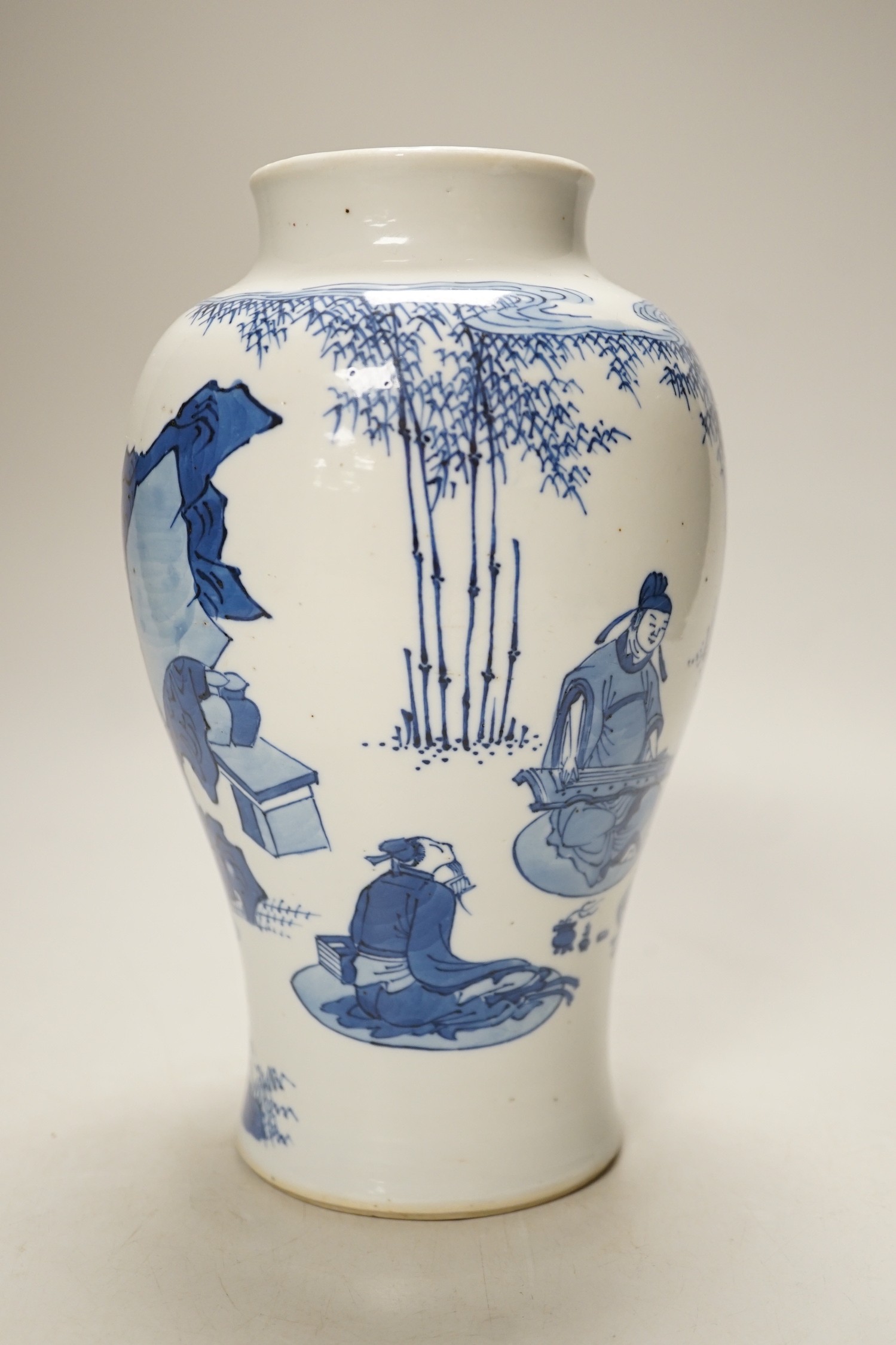 A Chinese blue and white inscribed baluster vase, 20cm tall